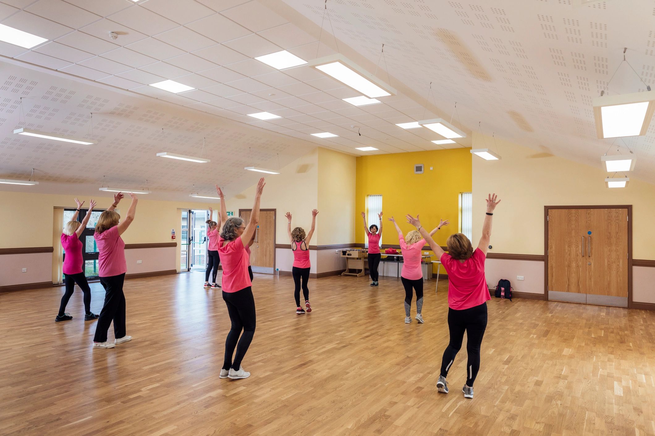 Instructor leading an energetic Zumba class